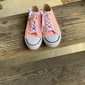 Orange airwalk converses
